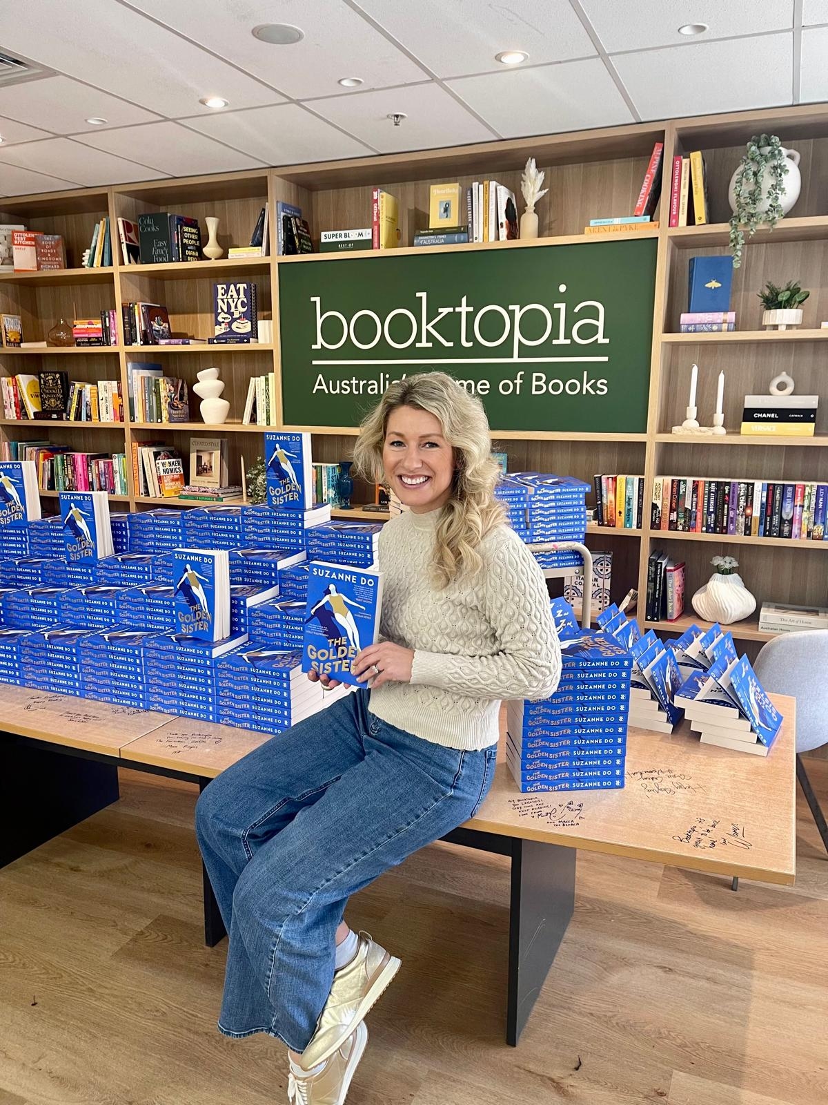 Signing hundreds of books at Booktopia!-Suzanne Do